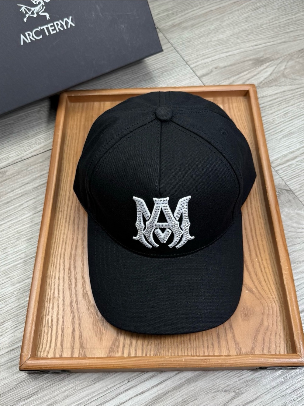 Black Baseball Cap with Raised White Emblem